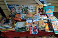 Overview of children's books showing multiple colorful titles and storybooks for younger children