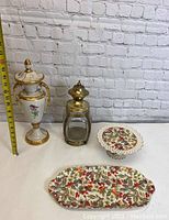 Photo showing all items: vintage urn, lantern, tray and snack plate, scale included