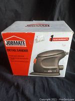 Front of Jobmate Detail Sander box showing product image, brand, one year warranty, and product name.