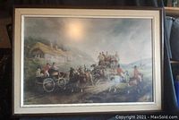 Framed antique style print showing a countryside stagecoach and riders scene