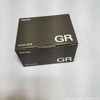 Closed Ricoh GR III retail box showing top branding