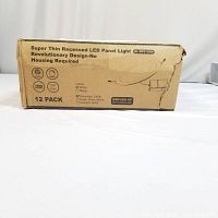Closed box showing 12 Pack Super Thin Recessed LED Panel Lights with details about color and wattage.