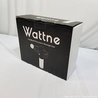 Box for Wattne handheld percussion massage gun featuring the product image and brand name.