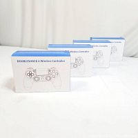 Four white retail boxes labeled 'DOUBLESCHOCK 4 Wireless Controller' shown side by side.