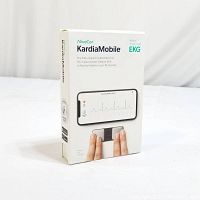 Front of AliveCor KardiaMobile box showing brand, product name, and image of the EKG device in use on fingers.