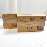 Two sealed cardboard cases of Cottonelle Flushable Wipes with printed product information.