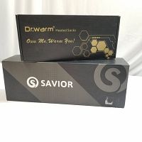 Two black boxes, one labeled Dr. Warm heated socks and the other Savior, showing product packaging for heated socks and gloves.