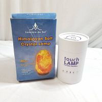 Box of Himalayan Salt Crystal Lamp labeled 'Lumiere de Sel Himalayan Salt Crystal Lamp Mini' with features and image of lamp.