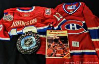 Two Canadian hockey jerseys, one with Johnson and number 13, NHL trivia game, and Official Guide and Record Book 1986-87