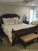 Front view of assembled king size bed with bedding