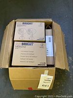 Box containing two NetBright MBN342 LED spotlight sets, each set includes 2 spotlights, visible packaging shows model and brand.