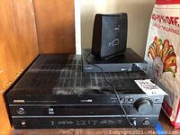 Yamaha receiver HTR-5400 with Sony Blu-Ray player BDP-S3700 and CEL-FI coverage unit on top
