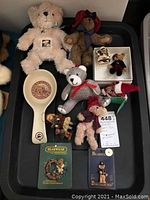 Top-down photo showing all 10 bear collectibles arranged on a black surface.