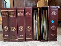 Front view of six National Geographic binders showing titles and condition