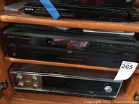 Denon DCM-280 CD changer above vintage Heathkit tube receiver inside wooden cabinet.