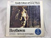 Front cover of record album with Beethoven bust and wooded background, titled "Beethoven The Pastoral-Sixth Symphony Album 1"