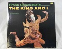 Front cover of Frank Chacksfield Orchestra The King And I vinyl LP showing a performer in costume.