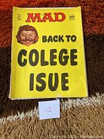 Front cover of MAD magazine December 1969 issue No.131 with Alfred E. Neuman caricature and yellow background.