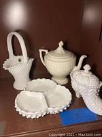 Three piece Fenton milk glass set with basket, divided dish, and shoe-shaped lidded container plus Washington colonial teapot
