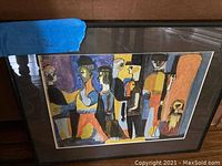 Front view of framed abstract art piece showing overall composition
