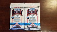 Two unopened 1991-1992 Upper Deck NHL Hockey Jumbo Packs side by side showing front packaging with NHL and Upper Deck branding.