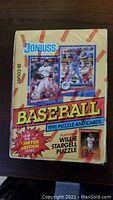Photo of sealed 1991 Donruss baseball box with 36 packs including a puzzle and cards featuring Willie Stargell.