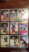 Nine hockey cards from the 1980-81 OPC series showing players from Rangers, Oilers, Islanders, Kings, Rockies, Maple Leafs, Bruins, and Blues.