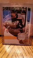 Front of game used jersey card showing Peter Forsberg in Nashville Predators uniform with embedded jersey swatch.