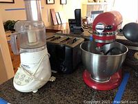 All three appliances on countertop: Cuisinart unit, toaster, KitchenAid mixer