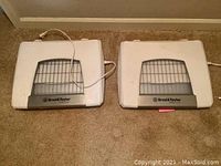 Two closed Brod & Taylor folding proofers side by side