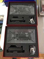 Both locomotives and tenders in original red and blue Proto 2000 boxes with foam inserts