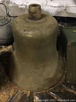 Front view of large cast iron bell body