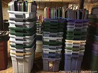 Overall view of stacked storage totes in assorted colors.