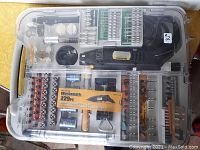 Full view of the Worksmith rotary tool and accessory kit set in plastic carrying case showing rotary tool and multiple accessory compartments with various bits, wheels, and attachments.