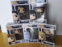 Front of all five boxed Funko Pop Rocks Metallica figurines showing models Robert Trujillo, Kirk Hammett, Lars Ulrich, Lady Justice, James Hetfield
