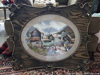 Framed watercolor painting showing the entire ornate frame and artwork inside, with visible detail and size context