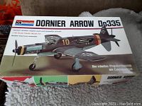 Box top showing artwork and model name Dornier Arrow Do335, with aircraft color scheme and markings visible