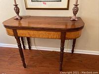 Front view of closed table top showing overall shape and finish