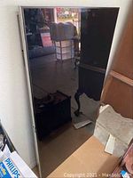 Front view of the TV showing the screen and bezel