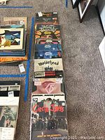 Group photo showing seven vinyl LP covers stacked: Mercyful Fate, King Diamond, Motörhead, Ramones, Naked Raygun, Circle Jerks