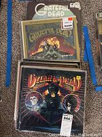 Stack of Grateful Dead albums with Dylan & The Dead at front