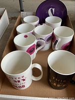Box containing set of 6 Royal Worcester mugs with pink and mauve poppies pattern and additional mugs.