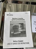 Instruction manual for Rival Professional Series Food Slicer in French.