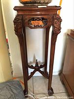 Full view of the wooden pedestal showing overall height, legs, and top surface with size tag 13x36