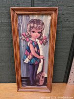 Full view of the framed print showing the girl holding a mandolin, standing with braided hair and harlequin dress.