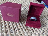 Red box with Affinity Diamonds branding and the ring inside.