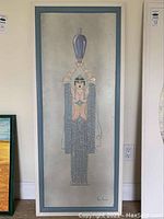 Full front view of framed artwork showing woman holding vessel