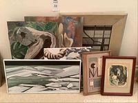 Collection of seven vintage abstract paintings grouped together showing variety of sizes and styles