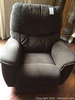 Front view of brown tweed La-Z-Boy recliner chair, showing cushioned armrests, backrest, and seat.