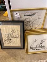 Overview of three framed prints including 'Identification Chart', 'Fishin' with the Kid!!' and 'Call of the Wild'